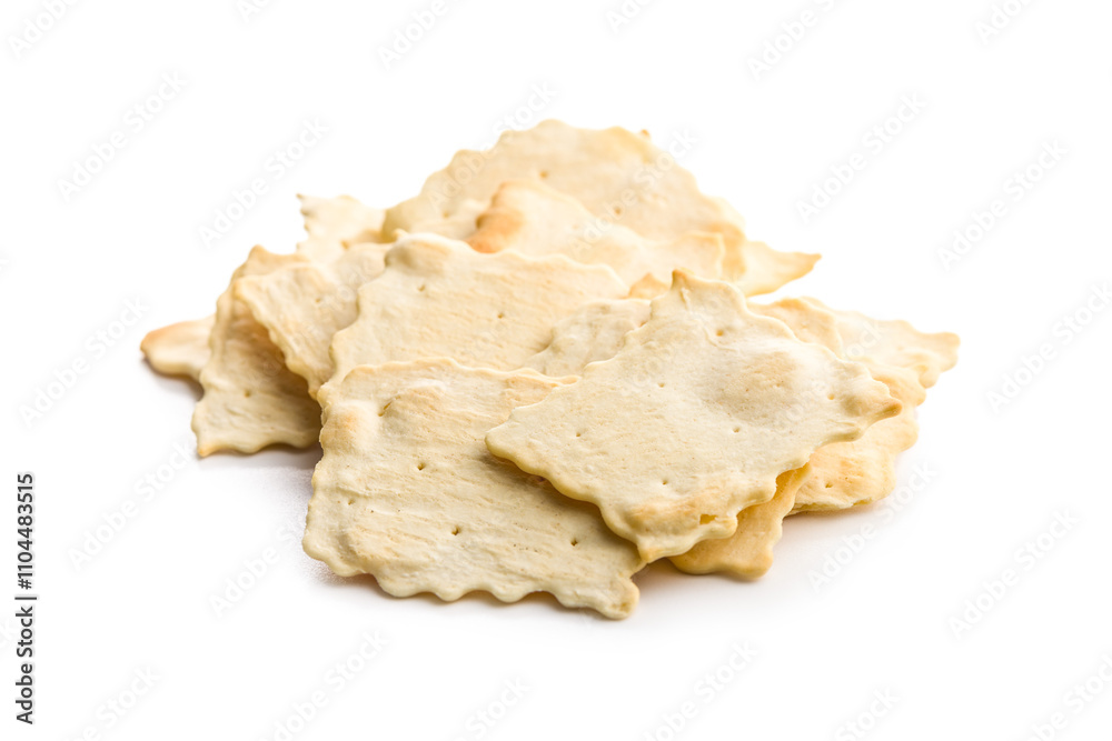 A crispy salted crackers isolated on white background. A crispy salted crackers isolated on white background.