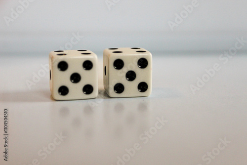 close-up of two die five dice. fifty-fifty or 10. image for Rule of 55 early retirement planning themes or games  game night entertainment. isolated on a white background 