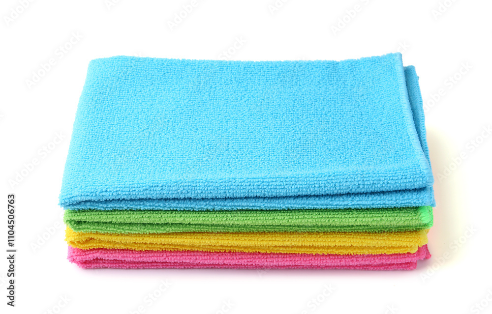 Stack of different microfiber cloths isolated on white Stack of different microfiber cloths isolated on white