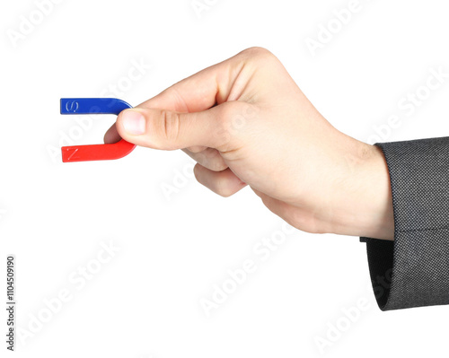 Man with horseshoe magnet on white background, closeup