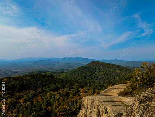 Panoramic View of Adirondack Mountains from the Summit on a Clear September Day at the Start of Autumn photo