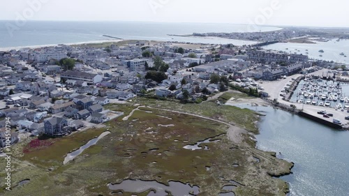 Aerial View of a Vibrant City and Bustling Harbor on a Sunny Day