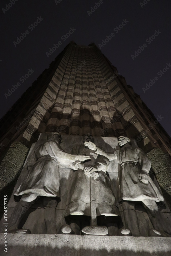 Sculpture group by Lambertus Zijl on the De Bazel building in Amsterdam, the Netherlands, depicting Trade and Industry