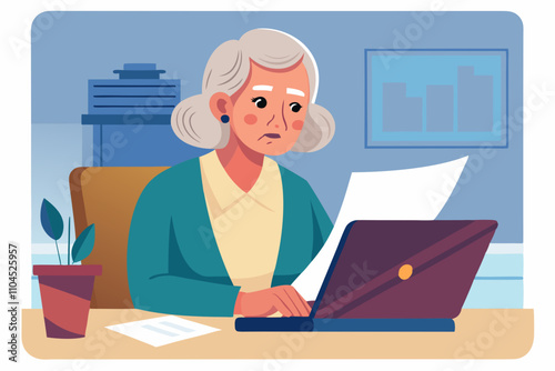 woman working on the computer. An older woman with a serious expression reading a document sitting at the desk with laptop