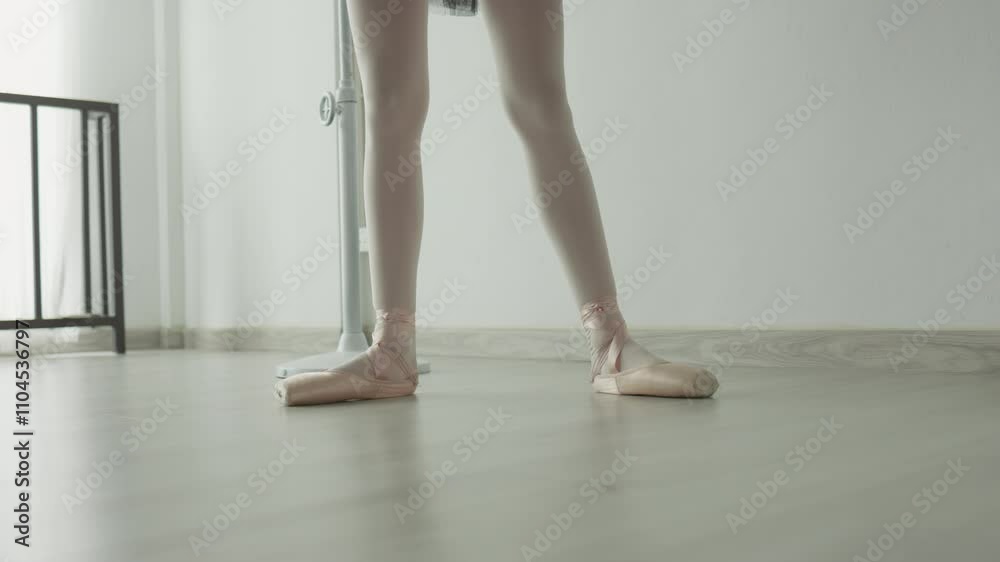 Ballet dancer in pointe shoes gracefully showcases elegance and strength, as serene studio environment enhances focus on technique and artistry in every performance. Ballet dancer in pointe shoes gracefully showcases elegance and strength, as serene studio environment enhances focus on technique and artistry in every performance.