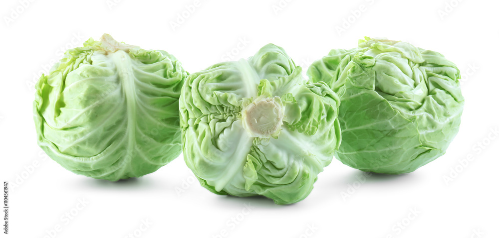 Fototapeta premium Three heads of cabbage isolated on white