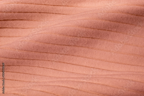 Peachy knit sweater texture. Background concept photo