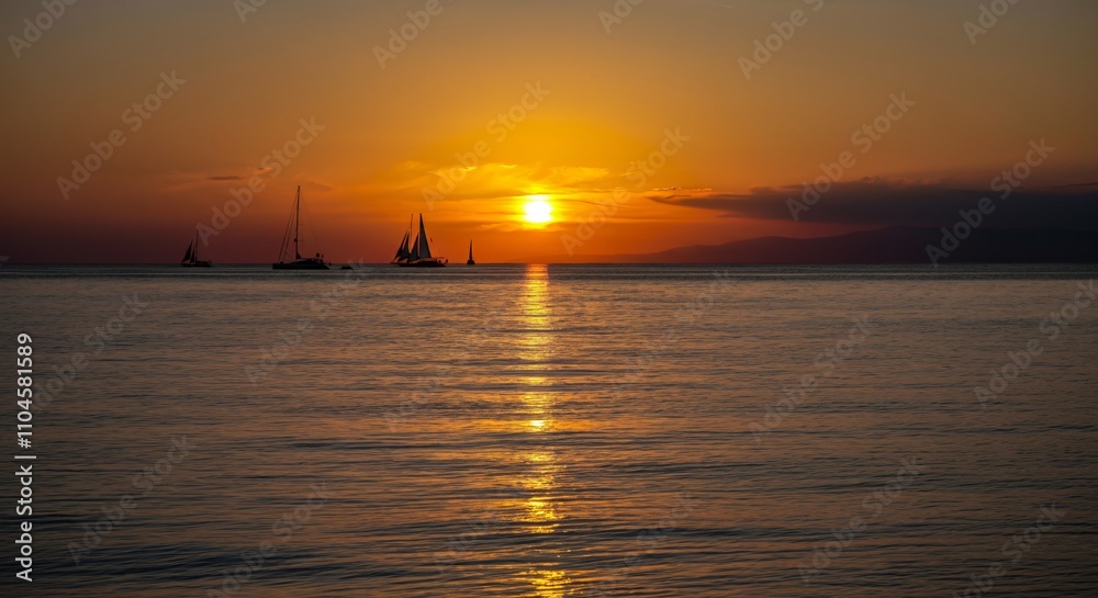 Golden Hour Maritime Scene - Sailboats Silhouette Against Calm Ocean Sunset Golden Hour Maritime Scene - Sailboats Silhouette Against Calm Ocean Sunset