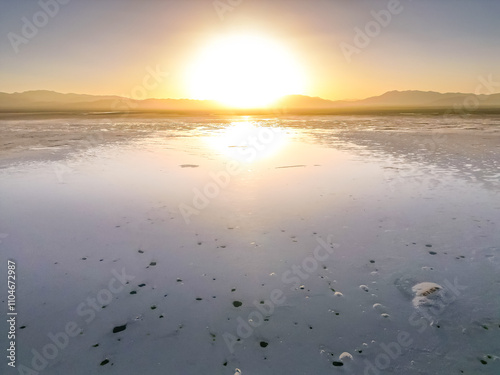 Chaka Salt Lake landscape with blue sky and Snow mountain background in northwest China. photo