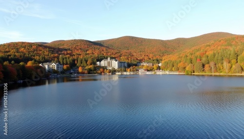  Tranquil lakeside retreat with autumnhued mountains photo