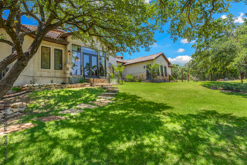 Beautiful sunny afternoon in a serene garden setting with lush green grass Beautiful sunny afternoon in a serene garden setting with lush green grass
