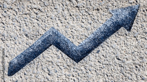 Blue upward arrow on asphalt. photo