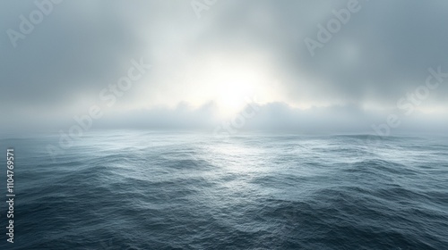 Serene Ocean Landscape Under Misty Clouds and Soft Light Reflection