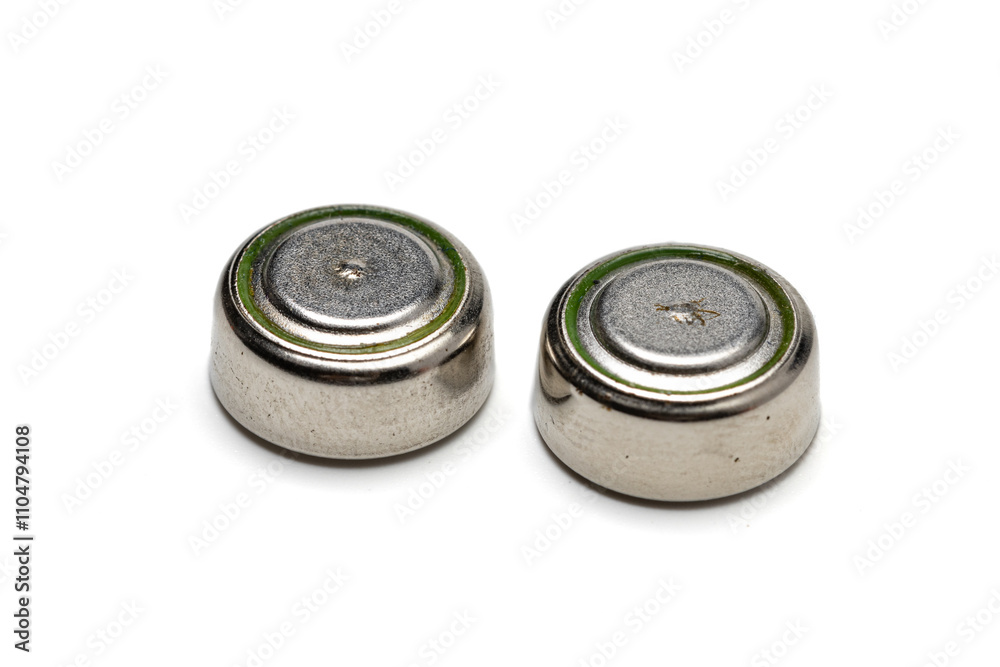 close up view of LR44 button cells or battery. Isolated in white background. close up view of LR44 button cells or battery. Isolated in white background.