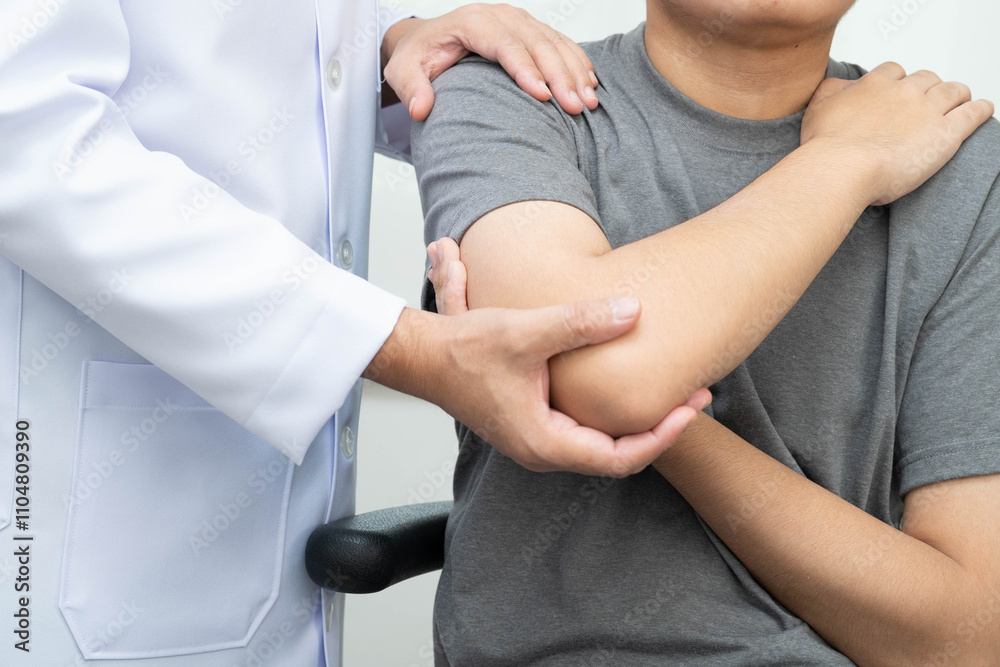 Physical therapy, Asian therapist doctor treat perform pain young man in hospital.