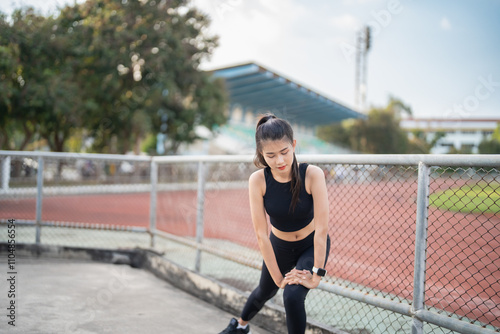 Active healthy asian woman exercising by running, jogging runner sports stadium during the morning healthcare and well being concept