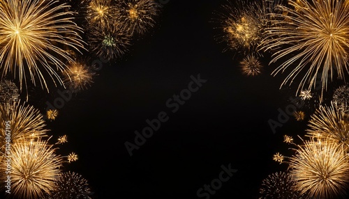A black background with vibrant fireworks bursting at the corners of the frame
