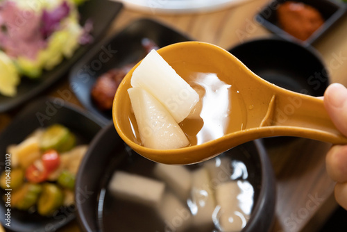 Korean side dish. Dongchimi water Kimchi photo