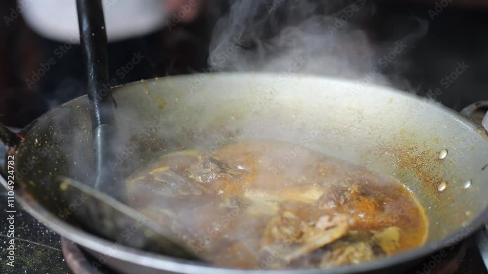 The making of tengkleng, a Javanese rib and curry stir-fry in Jogjakarta. Cooking Tengkleng, lamb meat with ribs and bone cooked in the traditional stove in Indonesia. The making of tengkleng, a Javanese rib and curry stir-fry in Jogjakarta. Cooking Tengkleng, lamb meat with ribs and bone cooked in the traditional stove in Indonesia.