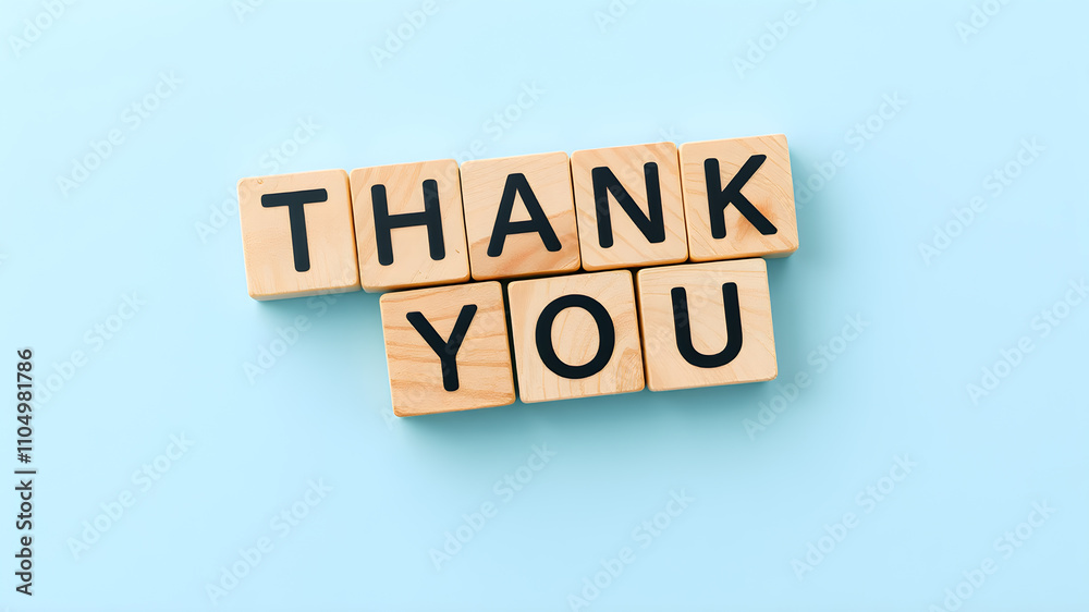 Thank you symbol. Wooden blocks with words Thank you. on blue background. Business and Thank you concept. Copy space.