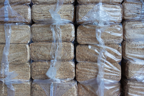 Organic pressed sawdust fuel briquettes