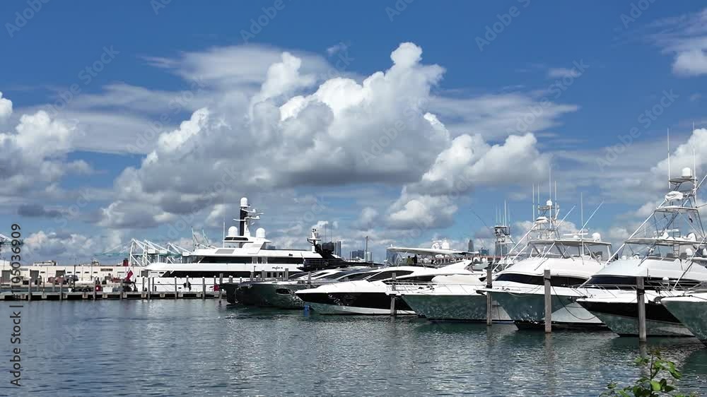 Private luxury boat anchored off Miami beach. Summer boat vacation. Yacht vacation. Yacht vacation in summer. Marina bay. Luxury motor yacht in sea marina bay. Yacht in navigation. Luxury cabin