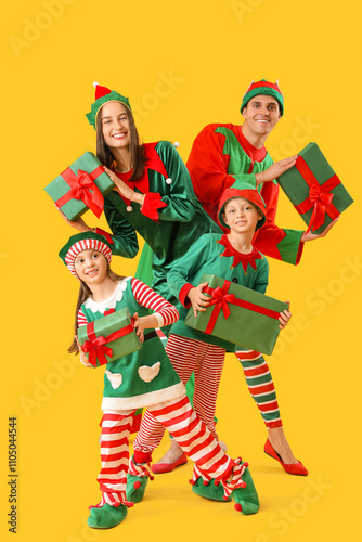 Happy family in elf's costu...