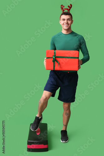 Young sporty man in reindee...