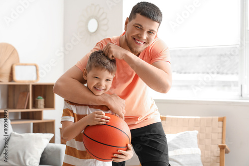 Young man and his little so...