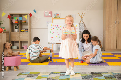 Cute little girl with build...