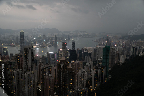 Hong Kong, Hong Kong, China - 11.17.2024 - evening view over Hong Kong harbour from the Peak