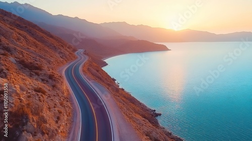 Fototapeta Naklejka Na Ścianę i Meble -  Beautiful nature scenery to travel on the colorful road landscape among the mountains by the sea. Traveling in the beach highway landscape during summer vacation. Turkey journey in green nature road.