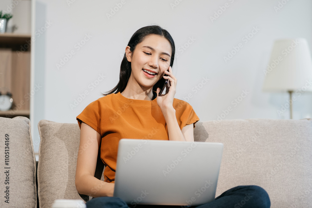 lifestyle Happy woman speaking to mobile phone at home. women speak with remote friend using phone. sitting on sofa. lifestyle Happy woman speaking to mobile phone at home. women speak with remote friend using phone. sitting on sofa.