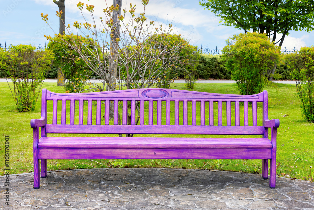 Vibrant purple bench resting peacefully in a lush park under a clear sky Vibrant purple bench resting peacefully in a lush park under a clear sky