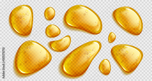Transparent golden liquid droplets with glossy surface and light reflections. Various sized drops honey like viscous texture with bubbles inside. Cosmetic serum, essential oil or natural sweetener.