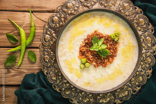 Arabic Cuisine; 'Jareesh' is a national dish in Saudi Arabia. It's a delicious grain-based stew made from crushed wheat. Garnished with fried onions and some melted butter.