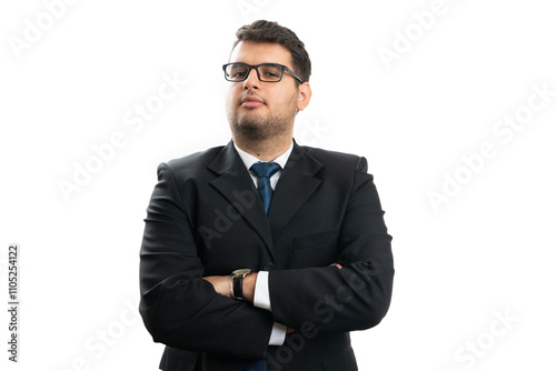 Portrait of corporate businessman wearing suit with arms crossed