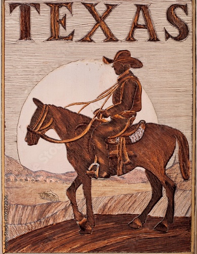 Cowboy wearing hat and boots riding horse in Texas desert. landscape background with sun rising over distant mountains and open plains. photo