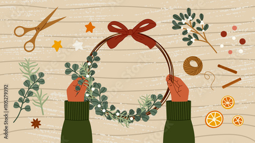 Woman crafting natural festive wreath top view on wooden table