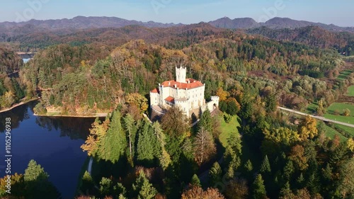 Amazing autumn video with a drone of the majestic old castle and lake of Trakoscan in Zagorje, northern Croatia photo