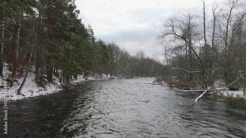 Winter and snow by a river  photo