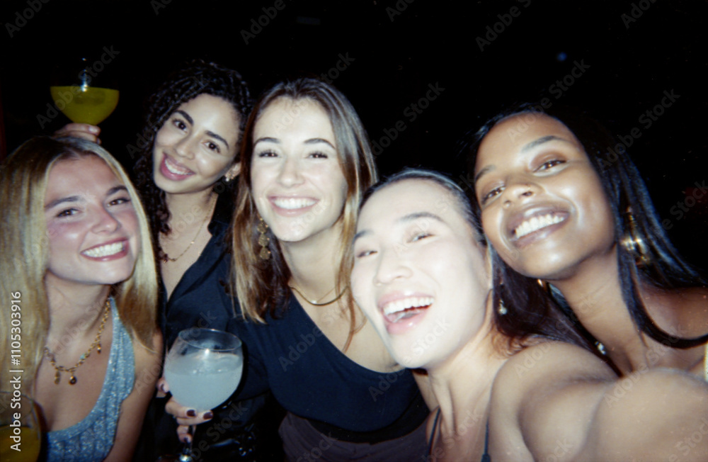 A group of happy friends posing together in a lively atmosphere, captured with a vintage film look, featuring dusty and scratched effects for a nostalgic feel. A group of happy friends posing together in a lively atmosphere, captured with a vintage film look, featuring dusty and scratched effects for a nostalgic feel.
