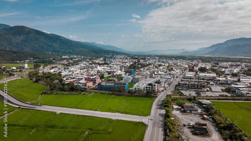 Obraz premium Aerial view of Yuli, Taiwan, highlighting vibrant city life and lush countryside