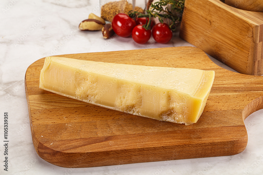 Hard parmesan cheese piece triangle Hard parmesan cheese piece triangle