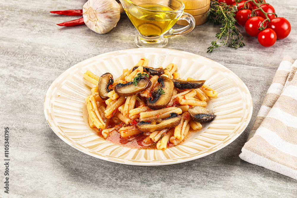Italian cuisine - casafecce with mushrooms Italian cuisine - casafecce with mushrooms