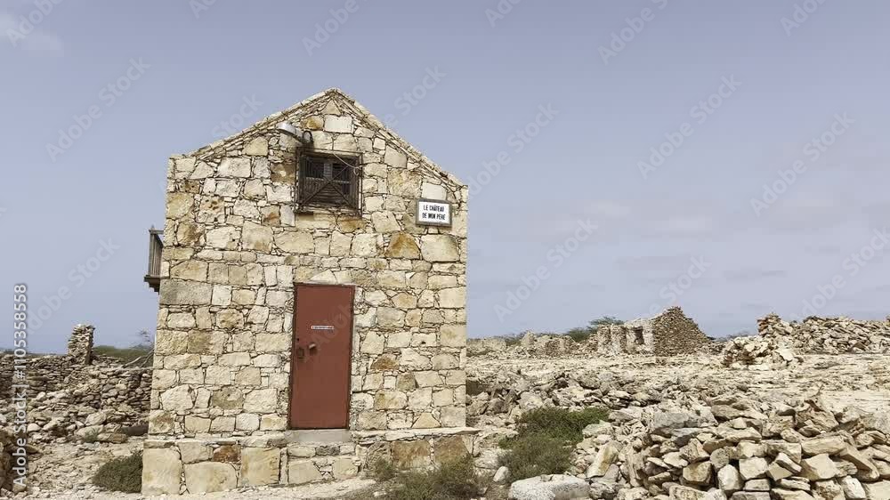 Curral Velho’s abandoned settlement on Boa Vista Island, Cape Verde. Stone structures, arid land, and cloudy skies capture its historical and cultural essence Curral Velho’s abandoned settlement on Boa Vista Island, Cape Verde. Stone structures, arid land, and cloudy skies capture its historical and cultural essence
