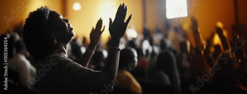 Black woman worshipping with raised hands in a vibrant church atmosphere.