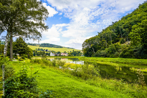 Reservoir on the dam wall at Diemelsee and the surrounding landscape. Nature at the Diemel Dam in the Sauerland.
 photo