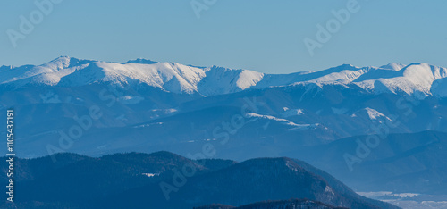 Nizke Tatry mountains between Chopok and Kotliska hill from hiking trail bellow Stoh hill summit in winter Mala Fatra mountains in Slovakia photo