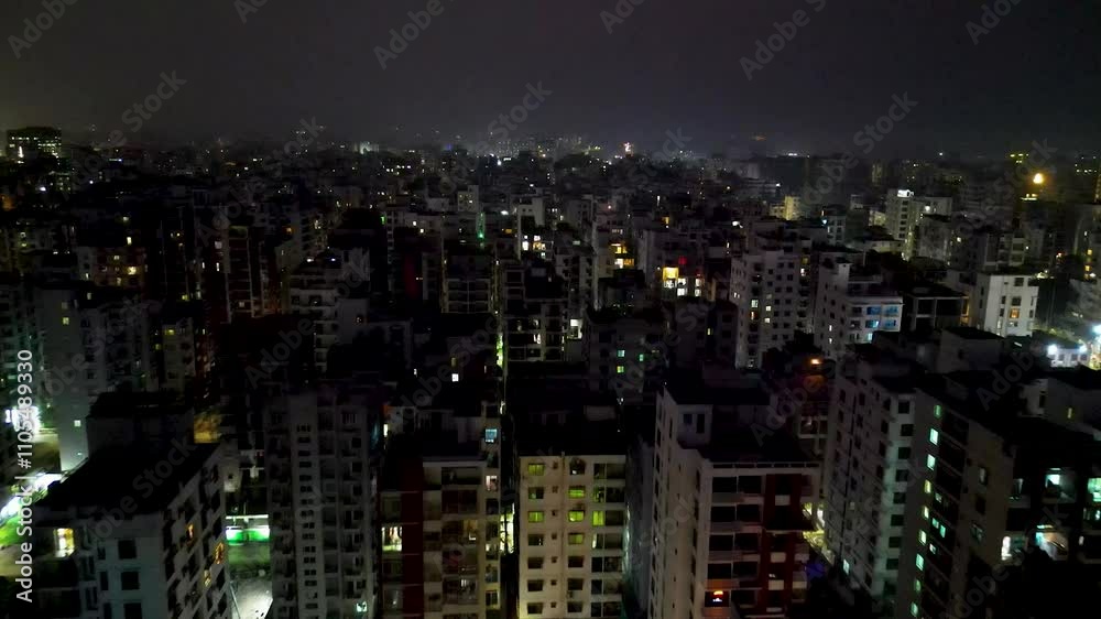 Vibrant Nighttime Cityscape with Illuminated Buildings Vibrant Nighttime Cityscape with Illuminated Buildings